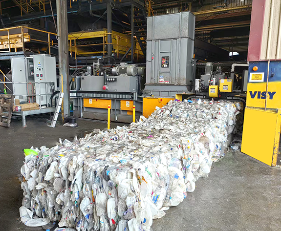 Solução de enfardamento multifuncional e de alta eficiência para o Centro de Reciclagem Abrangente da Austrália